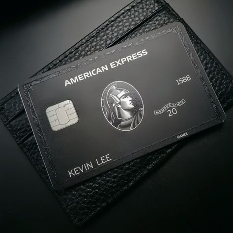 American Express card displayed in a black leather wallet